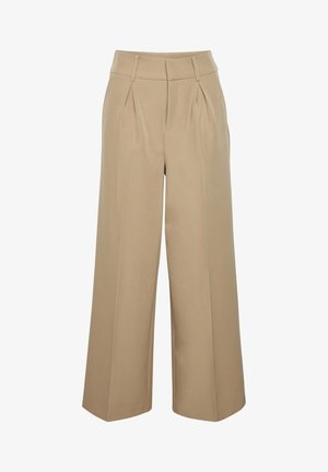 Beige vidde ben bukser med fold foran, en glat tekstur og en skræddersyet talje. Heller er vid og lige skåret.