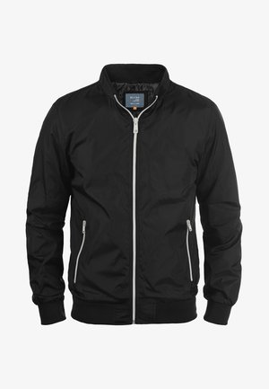 Black bomber jacket made of lightweight fabric with a zipper front, side pockets, and ribbed cuffs and hem. Minimalist design without patterns.