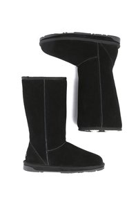 Black suede knee-high boots with a flat rubber sole, featuring contrasting stitching and a rounded toe design.