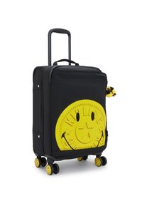 Musta matkalaukku, jossa on suuri keltainen hymiökuvio, kumimainen pinta, neljä keltaista pyörää ja ulosvedettävä musta kahva.