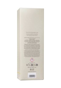 Cardboard packaging, cream color with a matte finish. Text includes safety warnings and product details, in multiple languages. 150 ml.