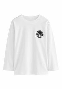 Weißes langärmeliges T-Shirt aus Baumwolle. Verfügt über ein schwarzes Grafikdesign eines Gorillas mit Kopfhörern auf der linken Brustseite. Glatte Textur.