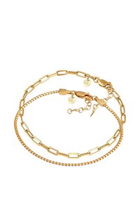 Guldtonet lagdelt armbånd med flad kæde og links kæde design, med lobster clasp og justerbar længde.