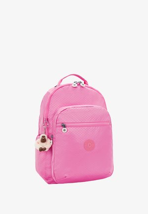 Pink backpack with a textured, quilted design. Features exterior zip pockets and a zipper pull charm resembling a monkey or gorilla.