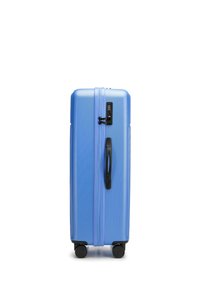 Blue hard-shell suitcase with a textured finish, dual zippers, a black handle, and two wheels for mobility.