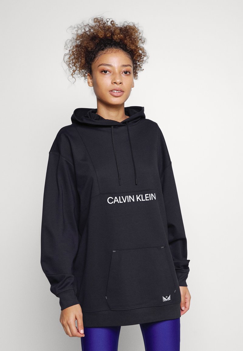 Damen Sportbekleidung | Calvin Klein Performance HOODIE Kapuzenpullover black/silver reflective/schwarz - HR42716 Damen Sportbekleidung | Calvin Klein Performance HOODIE Kapuzenpullover black/silver reflective/schwarz - HR42716