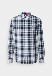Męska koszula na długi rękaw zapinana na guziki, w granatowo-biało-szary wzór w kratę, z małym logo na kieszeni na piersi.