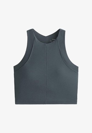 Top de sport gris court avec une texture côtelée, sans manches et un col haut. Présente des motifs diagonaux sur le tissu.