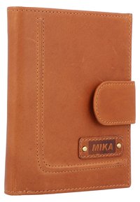 Leather wallet in tan, featuring a fold-over closure, stitching detail, and a visible brand label with gold hardware accents.