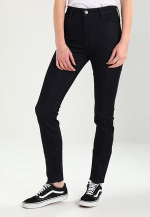 Högmidjade, slim-fit svarta jeans i denim med en jämn textur, med en framsidesknapp och dragkedja, samt klassisk femficksdesign.