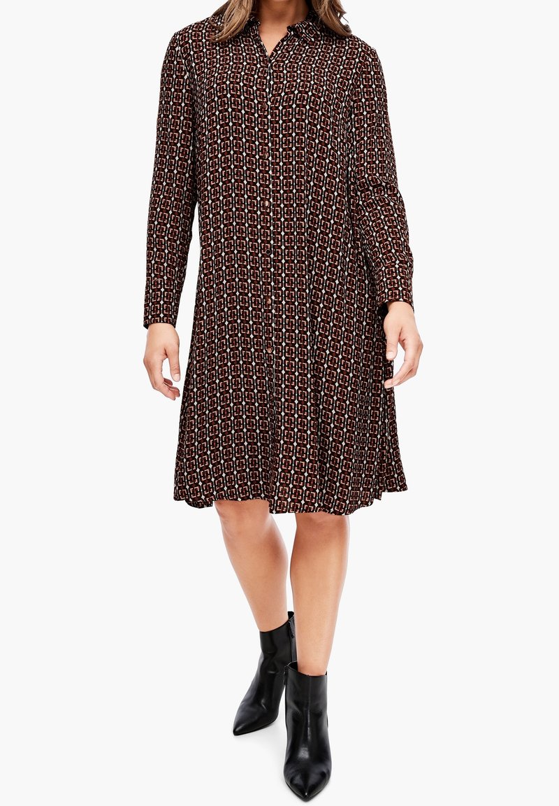 Šaty s dlouhým rukávem a límečkem v tmavě hnědé barvě s geometrickým vzorem v krémové a červené, s uvolněným střihem, končícími nad kolenem.