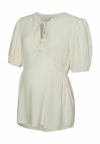 Lys cremefarvet bluse med korte, puffede ærmer, rund halsudskæring, frontknapper og snøredetalje ved halsen. Glat tekstur.
