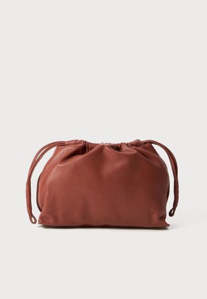 Soft brown leather pouch bag with gathered top and two drawstring closures on a white background.