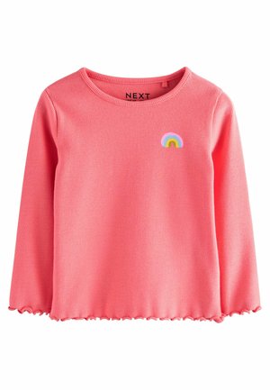 Haut à manches longues rose côtelé avec des bords en scallop et un petit graphique arc-en-ciel sur la poitrine gauche. Étiquette de marque : NEXT.