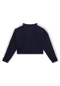 Navy cropped sweatshirt with a crew neckline, white side stripes featuring text, and ribbed cuffs. Soft fabric with a smooth texture.