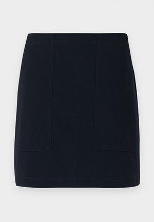 Námořnická modrá mini sukně z bavlny, která má dvě přední kapsy, čistý, strukturovaný design a rovný lem.