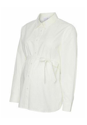 Blusa premaman bianca a maniche lunghe con bottoni frontali, colletto a punta e dettaglio di fiocco annodato sopra la pancia.