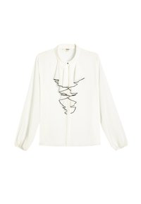 Camisa blanca de manga larga con cuello alto, con un diseño delantero acampanado en negro, hecha de un tejido suave.