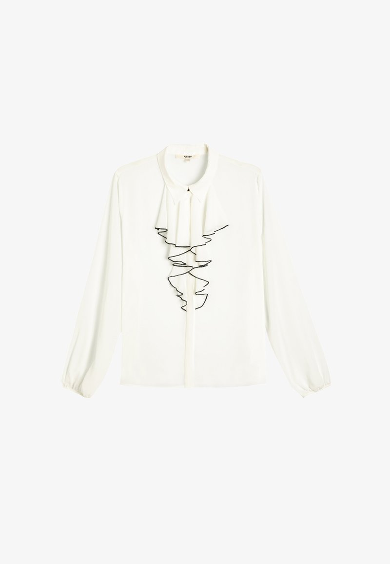 Weißes Langarmhemd mit hohem Kragen, das ein volantes Vorderdesign in Schwarz aufweist, gefertigt aus einem glatten Stoff.