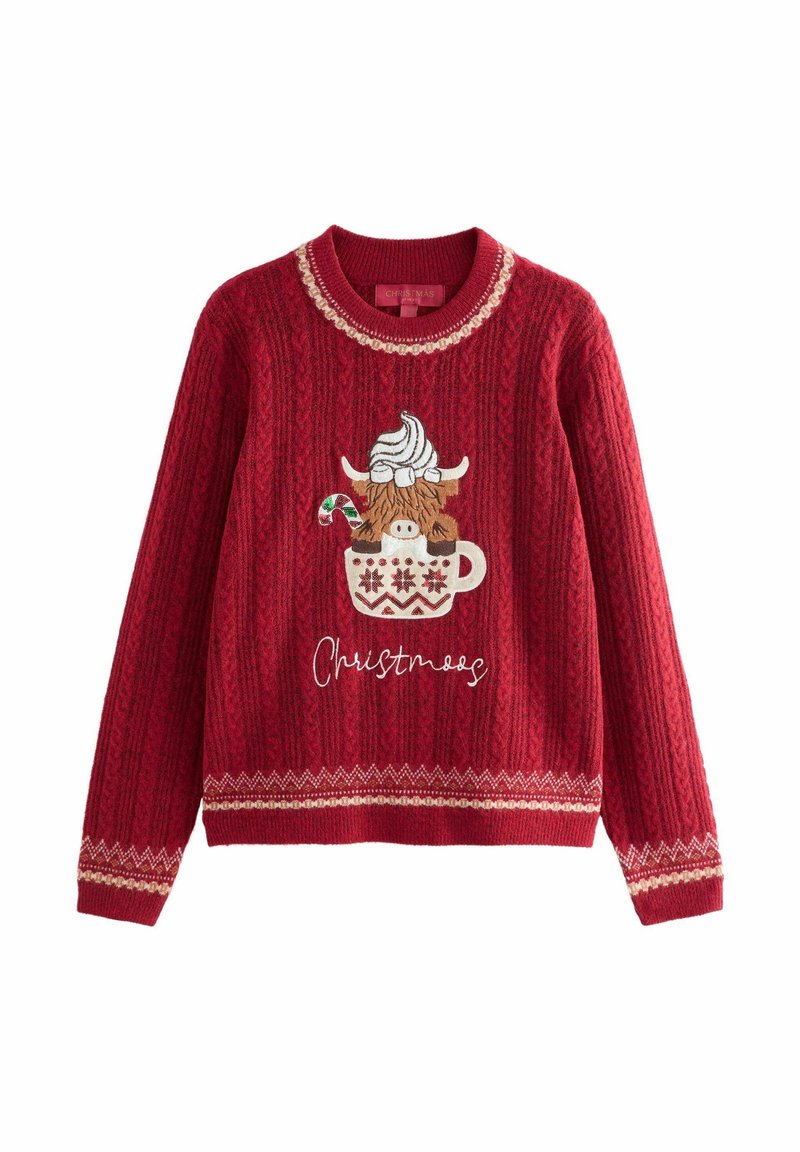Pull de Noël rouge tricoté avec une vache Highland dans une tasse surmontée de crème chantilly et d’un sucre d’orge, texte « Christmoos » en dessous.