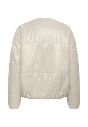 Kūno spalvos pūkinė striukė, pasižymi blizgia, siuvinėta išorine dalimi, trumpu siluetu ir elastinga apačia su pažemintais pečiais.