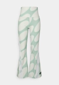 Flarpade träningsbyxor i mintgrön med vita abstrakta mönster, med hög midja och sidostråk. Tillverkade av elastiskt tyg.