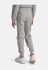 Under Armour RIVAL FLEECE - Pantalon de survêtement - mod gray light heather