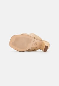 Unisa SABAS - Mules de salto - butter