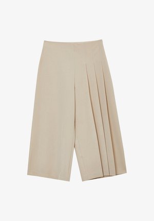 Gonna beige al ginocchio con ampie pieghe da un lato e un pannello liscio e piatto dall'altro, realizzata in tessuto leggero.