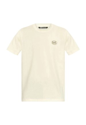 T-shirt a maniche corte color crema in cotone, con scollatura rotonda e un piccolo logo EA7 in beige sul petto sinistro.