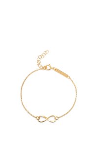 Pulsera chapada en oro con un centro en forma de símbolo de infinito. Cadena delicada con cierre ajustable y etiqueta grabada que dice "SINGULAR."