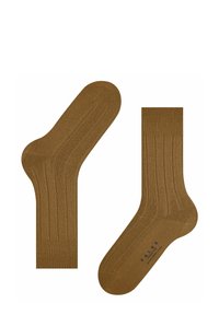 Calzini marroni a coste realizzati in un materiale liscio, con un design a righe. Il nome del marchio è stampato sulla suola in un colore a contrasto.
