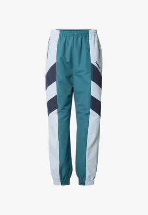 Spodnie dresowe w kolorze morskim i jasnoszarym z wzorami w kształcie szewronów, elastyczną talią, bocznymi kieszeniami oraz ściągaczami przy kostkach.