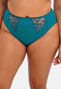 Culotte taille haute teal avec des panneaux en mesh transparent, de la broderie florale et des bords en forme de vagues. Le tissu doux offre confort et couvrance.