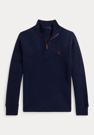 Pull bleu marine à manches longues avec fermeture éclair courte et petit logo brodé rouge sur la poitrine gauche.