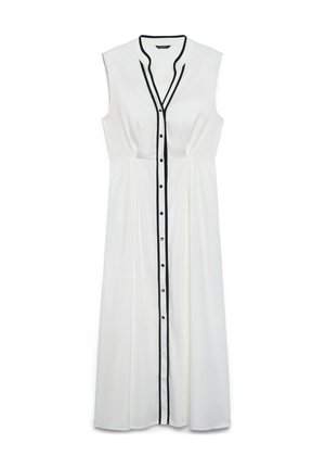 Abito midi bianco senza maniche con rifiniture nere lungo la scollatura a V e abbottonatura frontale, con una vita leggermente sagomata.