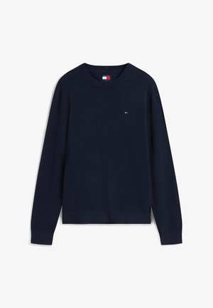 Navy blue long-sleeve crewneck sweater with small Tommy Jeans logo on left chest, ribbed cuffs and hem, flat lay on white background.