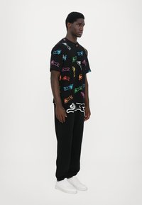 Icecream RUNNING DOG - Print T-shirt - black