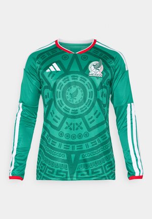 Green long-sleeve Mexico soccer jersey with Aztec calendar design, red collar trim, white Adidas logo, and white three stripes on sleeves.