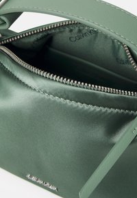 Calvin Klein ELEVATED SOFT MINI BAG - Borsa a tracolla - sea spray