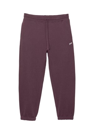 Bordeaux sweatpants med tapered fit, elastisk talje og snørelukning. Har et lille hvidt logo på siden. Glat bomuldsblandingsmateriale.