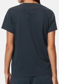 Dark navy short-sleeve t-shirt made from soft cotton fabric, featuring a classic crew neckline, with a relaxed fit and no visible detailing.
