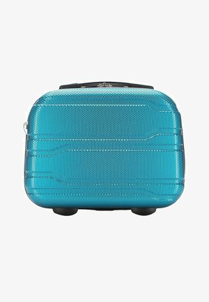 Valigia rigida blu con superficie texturizzata, caratterizzata da un design rettangolare elegante, maniglia superiore e quattro piccole ruote per la mobilità.