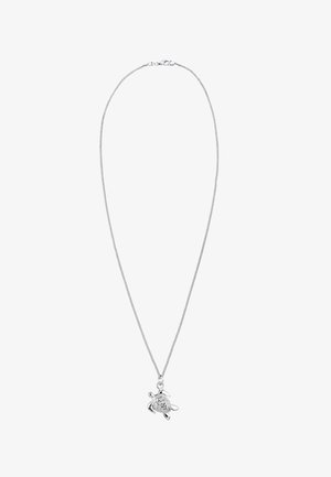 Collier chaîne en argent avec un petit pendentif en forme de tortue présentant une carapace et des membres détaillés.