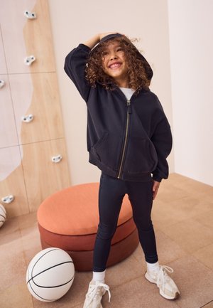 Next, THROUGH  - Sweat zippé - black