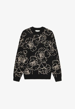 Mustast kampsunist, millel on kreemikas keerukas lillemuster. Ümar kaelus, pikad varrukad ning soonikkud käiste ja äärega. Kootud tekstuur.