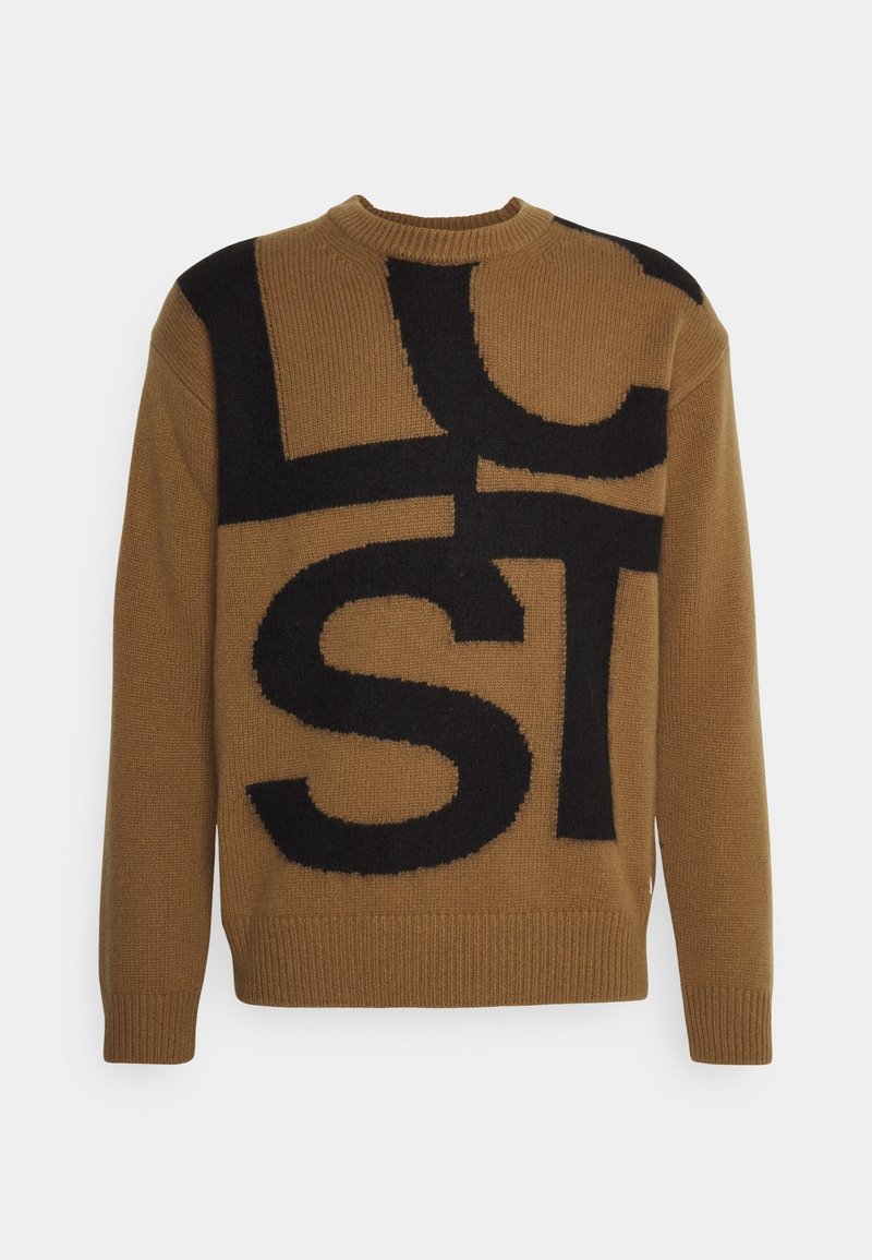Knit sweater in brown with a bold black graphic design. Features a round neck, long sleeves, and ribbed cuffs and hem. Soft texture.