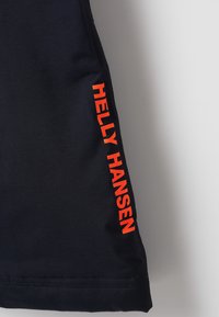 Marineblauwe korte mouw shirt van katoen met een gladde textuur, met een oranje "HELLE HANSEN" logo aan de zijkant gedrukt.