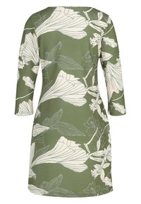 Zielona sukienka w kształcie litery A z rękawami o długości do łokcia i białym kwiatowym wzorem. Teksturowana tkanina z dużymi, zarysowanymi kwiatami i liśćmi.