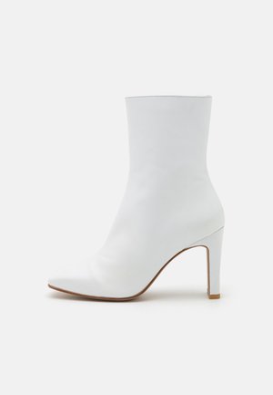 Enkellaarsjes met hoge hak - off-white